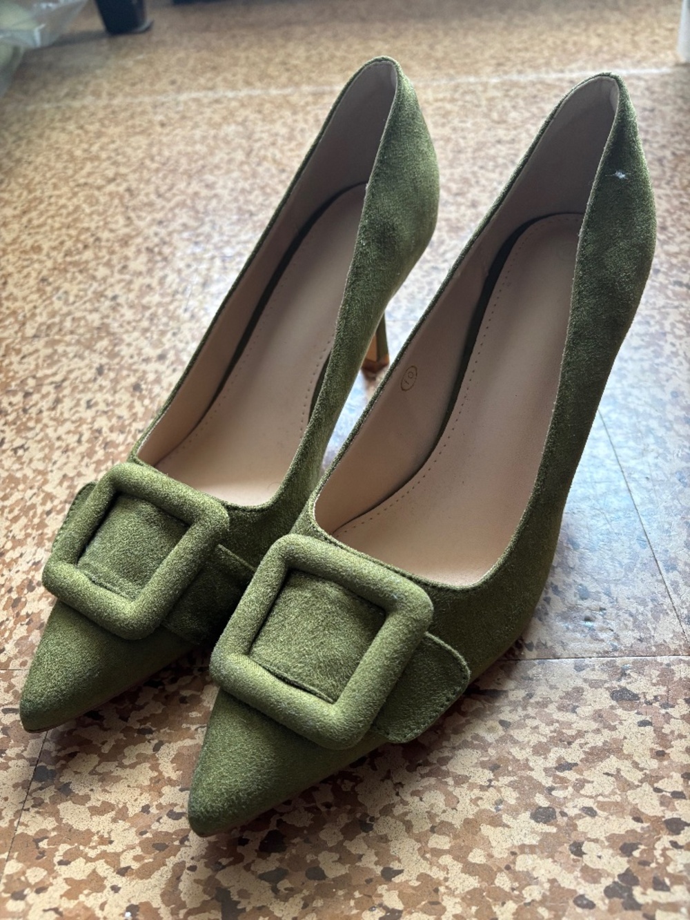 Green faux suede pumps